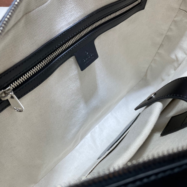 G*u*i gg embossed briefcase